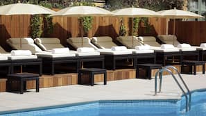 Seasonal outdoor pool, open 8:00 AM to 9:00 PM, pool umbrellas