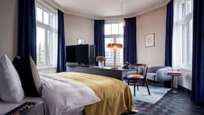 Hypoallergeen beddengoed, een minibar, een kluis op de kamer, een bureau
