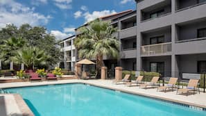 Outdoor pool, pool umbrellas, sun loungers