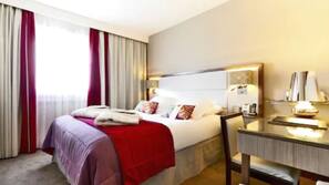 Free minibar, in-room safe, desk, blackout curtains