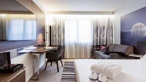 Premium bedding, memory-foam beds, free minibar, in-room safe