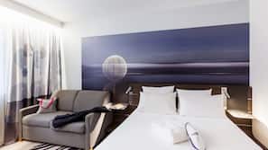 Premium bedding, memory-foam beds, free minibar, in-room safe