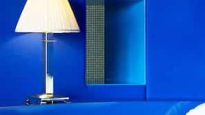 Hypo-allergenic bedding, free minibar items, in-room safe, desk