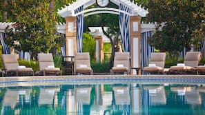 Outdoor pool, open 6:30 AM to 11:00 PM, free cabanas, pool umbrellas