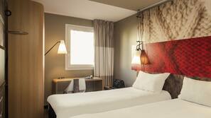 Desk, blackout curtains, iron/ironing board, rollaway beds