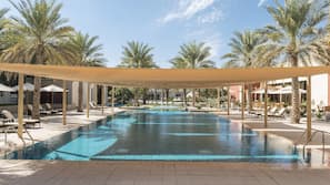 Indoor pool, 2 outdoor pools, open 7:00 AM to 7:00 PM, pool umbrellas