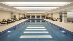 Indoor pool, 2 outdoor pools, open 7:00 AM to 7:00 PM, pool umbrellas