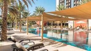 Indoor pool, 2 outdoor pools, open 7:00 AM to 7:00 PM, pool umbrellas