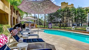 Outdoor pool, free cabanas, pool umbrellas
