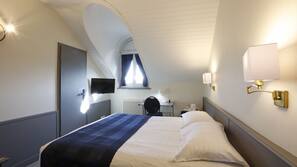 Minibar, coffre-forts dans les chambres, bureau