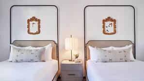 Premium bedding, down comforters, pillowtop beds, in-room safe