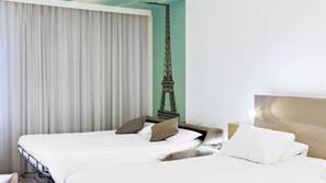 Premium bedding, free minibar items, in-room safe, desk