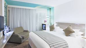 Premium bedding, free minibar items, in-room safe, desk