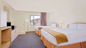 Desk, blackout curtains, iron/ironing board, rollaway beds