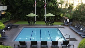 Outdoor pool, open 9:00 AM to 6:00 PM, pool umbrellas