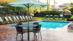 Outdoor pool, open 9:00 AM to 6:00 PM, pool umbrellas