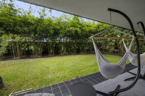 Deluxe Room, Garden View | Terrace/patio