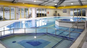 Indoor pool, open 6:30 AM to 10:00 PM, pool loungers