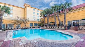 Outdoor pool, pool umbrellas, sun loungers