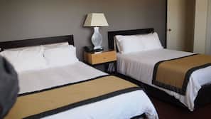 Roupas de cama premium, cofres nos quartos, individualmente mobiliados
