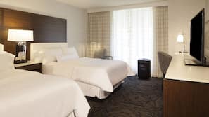 Premium bedding, down comforters, pillowtop beds, in-room safe