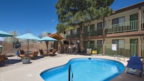 Seasonal outdoor pool, pool umbrellas, sun loungers
