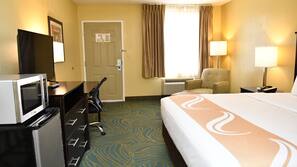 Premium bedding, desk, laptop workspace, blackout curtains