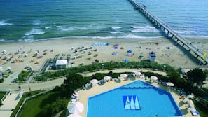 Indoor pool, outdoor pool, pool umbrellas
