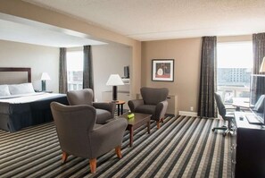 Suite, 1 King Bed, Non Smoking (No pet friendly) | Desk, laptop workspace, blackout drapes, iron/ironing board