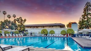 Outdoor pool, open 8 AM to 10 PM, pool umbrellas, sun loungers