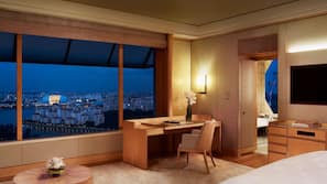 Premium bedding, down comforters, minibar, in-room safe