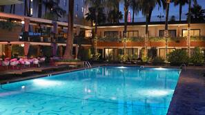 Outdoor pool, pool umbrellas, sun loungers