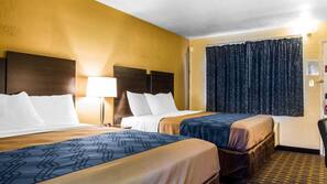 Desk, blackout drapes, iron/ironing board, rollaway beds