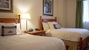 Hypo-allergenic bedding, desk, laptop workspace, blackout curtains