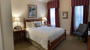 Hypo-allergenic bedding, desk, laptop workspace, blackout curtains