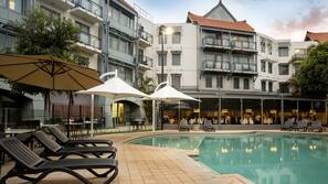 Outdoor pool, pool umbrellas, pool loungers
