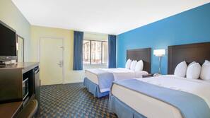 Desk, blackout drapes, iron/ironing board, rollaway beds