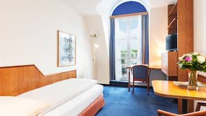 Luxe beddengoed, donzen dekbedden, een gratis minibar