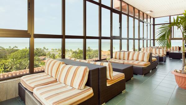 3 bars/lounges, poolside bar, beach bar