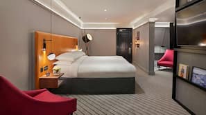 Premium bedding, free minibar items, in-room safe, desk