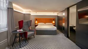Premium bedding, free minibar items, in-room safe, desk