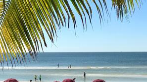 On the beach, white sand, 3 beach bars