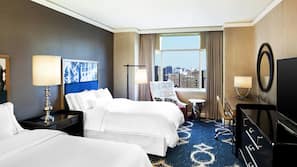 Premium bedding, down comforters, pillowtop beds, minibar
