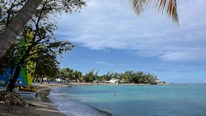 Private beach, white sand, free beach shuttle, sun loungers