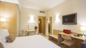In-room safe, desk, laptop workspace, blackout curtains