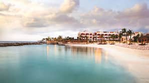 Private beach, white sand, beach umbrellas, beach towels
