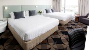 Minibar, desk, blackout drapes, iron/ironing board