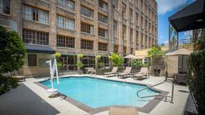Outdoor pool, pool umbrellas, sun loungers