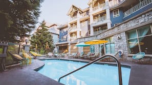 Outdoor pool, pool umbrellas, sun loungers