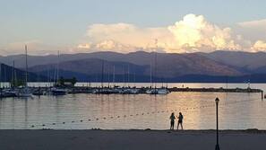 On the beach, waterskiing, windsurfing, rowing